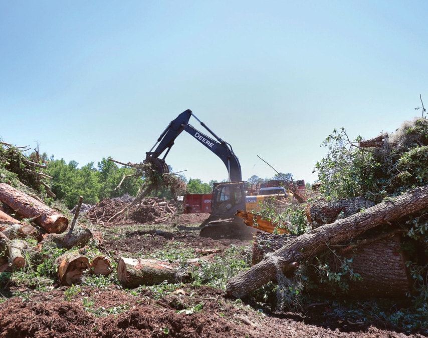 Gaston's Tree Debris Recycling excavator in action